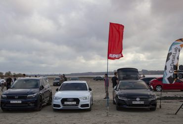 машины и флаг RUPES